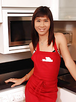 Erotic shemale poses in the kitchen